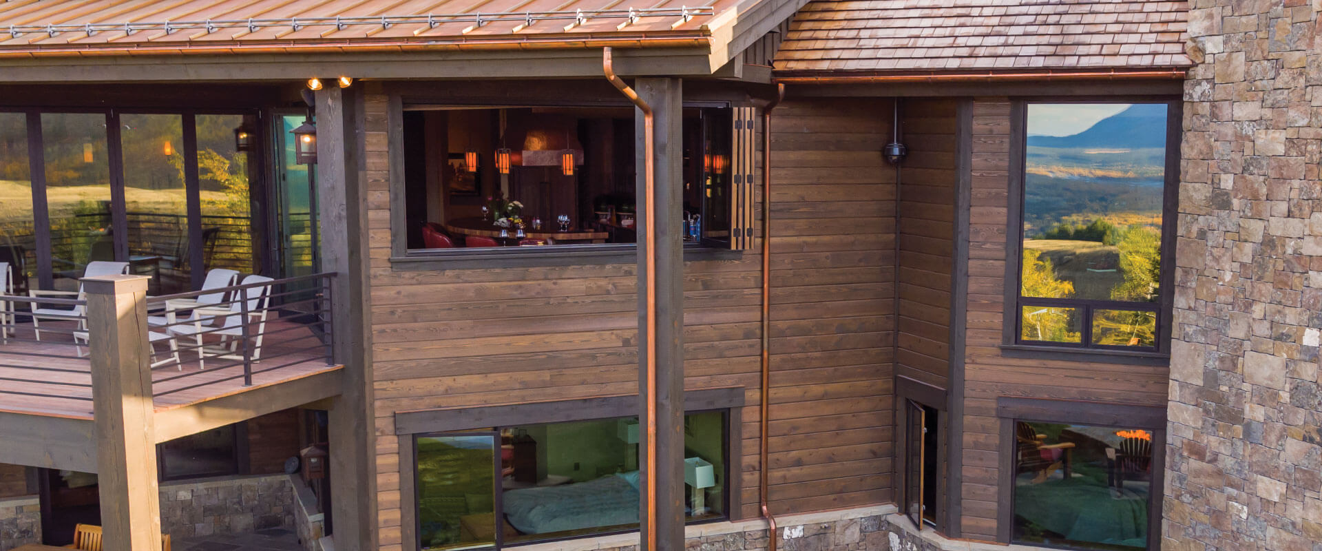 VistaLuxe Casements, Awnings, Folding Windows & Door Exterior Wood & Stone Home Evening