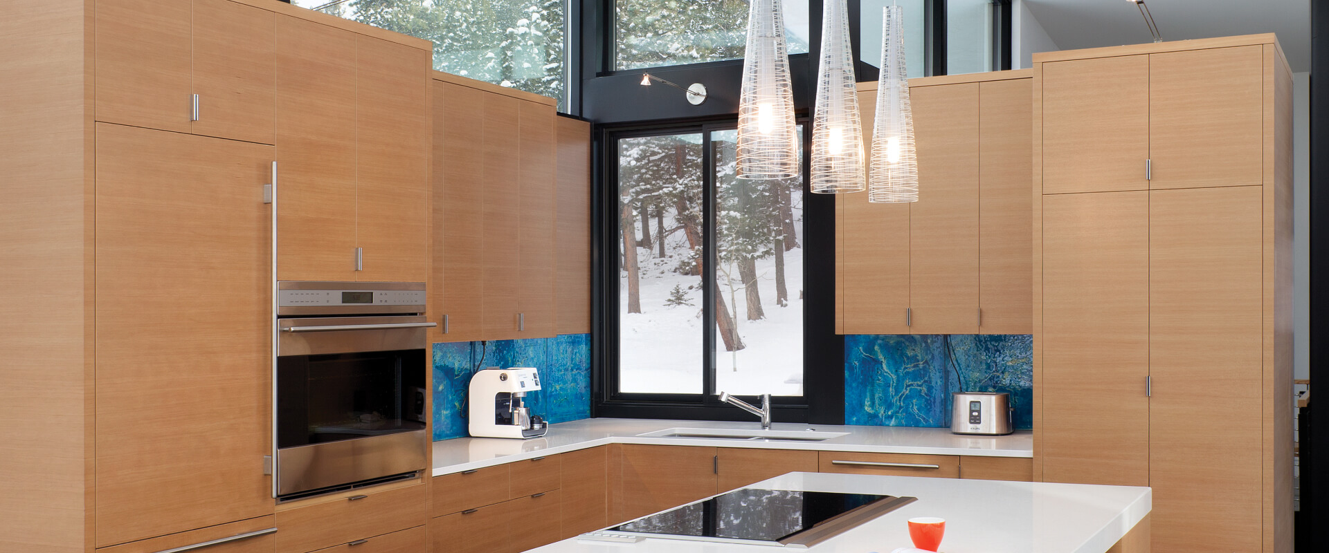 VistaLuxe Complementary direct set and double sliding windows with Coal Black interior paint and Matte Black hardware.