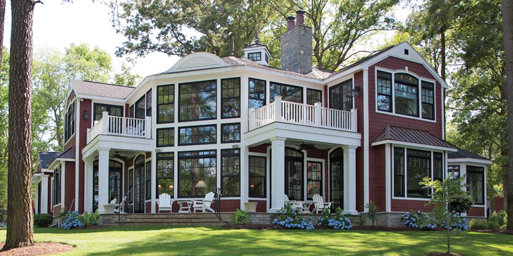 n this charming home, our Ultra Series Sterling double hung windows and picture double hungs with transoms create a two-story wall of windows