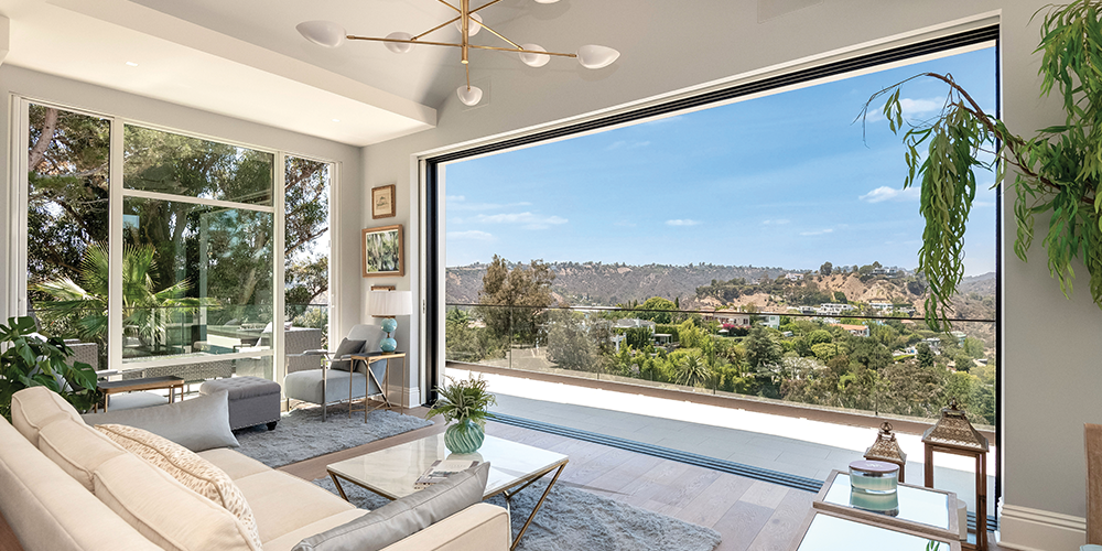 Expansive Pocketing Multi-Slide Door